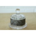 A beautiful glass "lidded" trinket bowl with stunning ornate metalwork detailing around the lid