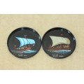 An incredible set of six black metal coasters with "Sailing Ships" from 20BC to 1850. RS17