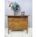 A beautiful solidly built 3-drawer chest of drawers with stunning styling & lift up top for a mirror