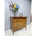 A beautiful solidly built 3-drawer chest of drawers with stunning styling & lift up top for a mirror