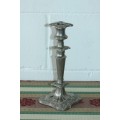 A stunning tall antique English made silver plated candle holder with incredible ornate detaining