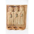 A gorgeous and unusual pottery/ stoneware six-candle holder depicting the three wise men