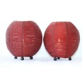 Two exquisite red beaded candle holders on a solid metal frame and metal feet; bid/holder