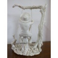A gorgeous "ornate" polished alabastrine oxylite figurine of two children on a swing