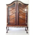 A magnificent solid teak "gabled" showcase display cabinet with large glass display shelves - WOW!