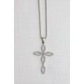 An exquisite large diamante encrusted sterling silver cross on a silver snake neck chain