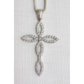 An exquisite large diamante encrusted sterling silver cross on a silver snake neck chain
