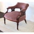 Two wonderful antique Edwardian upholstered library armchairs on their original porcelain castors