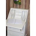 A stunning "eggshell" white flip-top writing desk with three large drawers and three smalls drawers