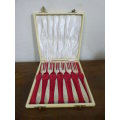 An amazing antique boxed set of Angora EPNS silver plated cake forks with stunning detailing