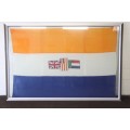A massive full size (1,8m x 1,3m) old SA flag in a stunning aluminium frame behind glass