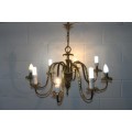 A gorgeous 8-arm solid brass ceiling chandelier with stunning ornate detailing in great condition
