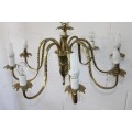 A gorgeous 8-arm solid brass ceiling chandelier with stunning ornate detailing in great condition