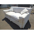 A stunning large modern styled slip covered couch in great condition. Perfect in informal lounges!