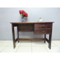 A lovely wooden writing/work desk with two spacious drawers in good condition. Perfect to paint.