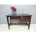 A lovely wooden writing/work desk with two spacious drawers in good condition. Perfect to paint.