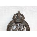A superb WWII British "National Defence Company" GRVI (King George 6th) Cap badge with Kings Crown