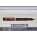 An incredible vintage Parker Duofold "Rubin Red" marbled MK1 ballpoint pen in its original box
