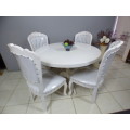 A fabulous upmarket dining room suite w 4 gorgeous chairs and a round table; beautiful & elegant!!!
