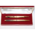 An awesome vintage "Caran d'Ache" gold plated pen & pencil set in its original presentation box