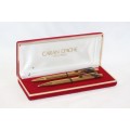 An awesome vintage "Caran d'Ache" gold plated pen & pencil set in its original presentation box
