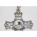 An exquisite LARGE ladies "Cross" pendant with a huge centre stone and a 60cm long chain