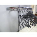 A stunning tall iron clothes carousel with hangers, height adjustable. Perfect for pants, blouses.