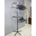 A stunning tall iron clothes carousel with hangers, height adjustable. Perfect for pants, blouses.