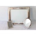 Three beautiful assorted silver metal/ silver plated free standing photo frames