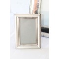 Three beautiful assorted silver metal/ silver plated free standing photo frames