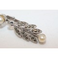 A stylish vintage Sphinx Jewellery Ladies silver metal earring set w/ Marcasite stones & faux pearls