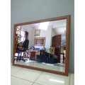 Lovely large framed wall mirror. Perfect in informal living areas, pub, lapa, patio.