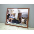 Lovely large framed wall mirror. Perfect in informal living areas, pub, lapa, patio.