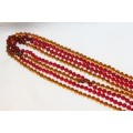Two superb (Long) single stand beaded ladies necklaces in an amber and in a deep red colour