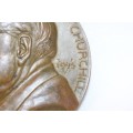 An original 1945 Winston Churchill bronze Victory Medal commemorating the end of World War II
