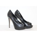 A stylish & elegant pair of black Aldo "snake-skin print" open-toe stiletto platform pumps