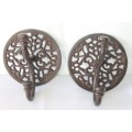 Two ornate & useful cast metal wall hooks in great condition, perfect for coats and hats - bid/hook