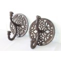 Two ornate & useful cast metal wall hooks in great condition, perfect for coats and hats - bid/hook
