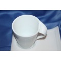 An awesome and stylish "modern" set of white porcelain coffee mugs on saucers - Unusual design