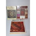 An assortment of informational "Oriental Rugs and Carpets" books