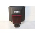 A Sigma EF-500 ST external camera flash gun with its original bag in excellent condition