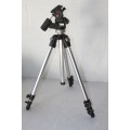 A durable and good quality Manfrotto 190D tripod with a strap in the original box
