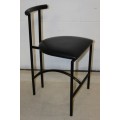 An awesome and sturdy black "Innovation" occasional chair with vinyl seat in great condition