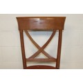 A lovely and sturdy solid cherry wood occasional chair with an upholstered seat