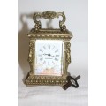 **RS17** A gorgeous ornate brass bevelled glass carriage clock w/ repousse detail & roman numerals