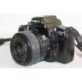 A Minolta Dynax 3xi 35mm film camera with a AF 35-80mm lens in a bag - RS17Sale