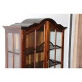 An incredible solid Stinkwood "gabled" display cabinet w/ large cottage pane doors & loads of space