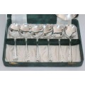 A superb boxed set of English made EPNS silver plated dessert spoons in stunning condition