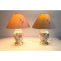 Two lovely porcelain table lamps with stunning shades and beautiful floral patterns on it
