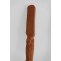A wonderful very large African hand carved spoon and fork with beautiful elephant carvings on it